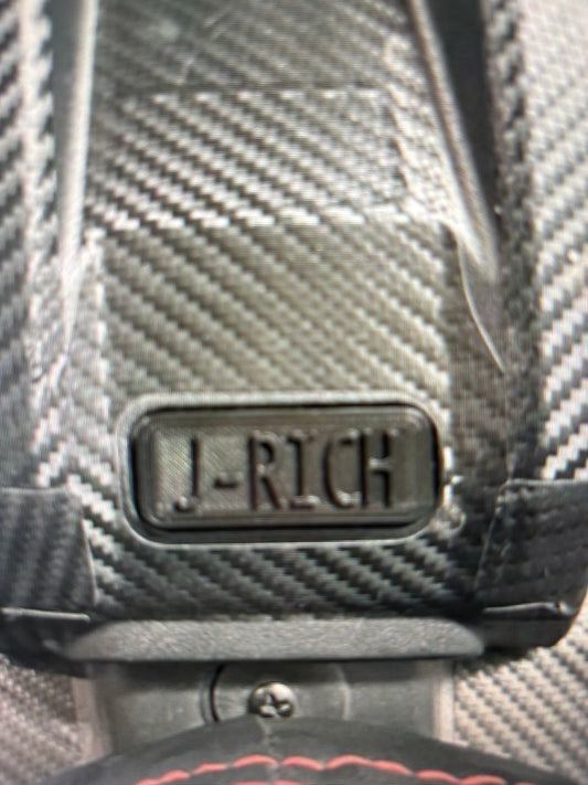 Surron battery lid badge