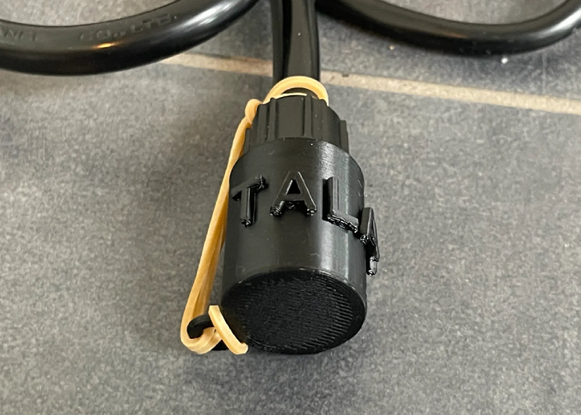 Talaria charger cap